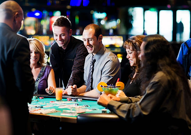 Live dealer table showcasing card distribution under studio lights on qq1221 alternatif